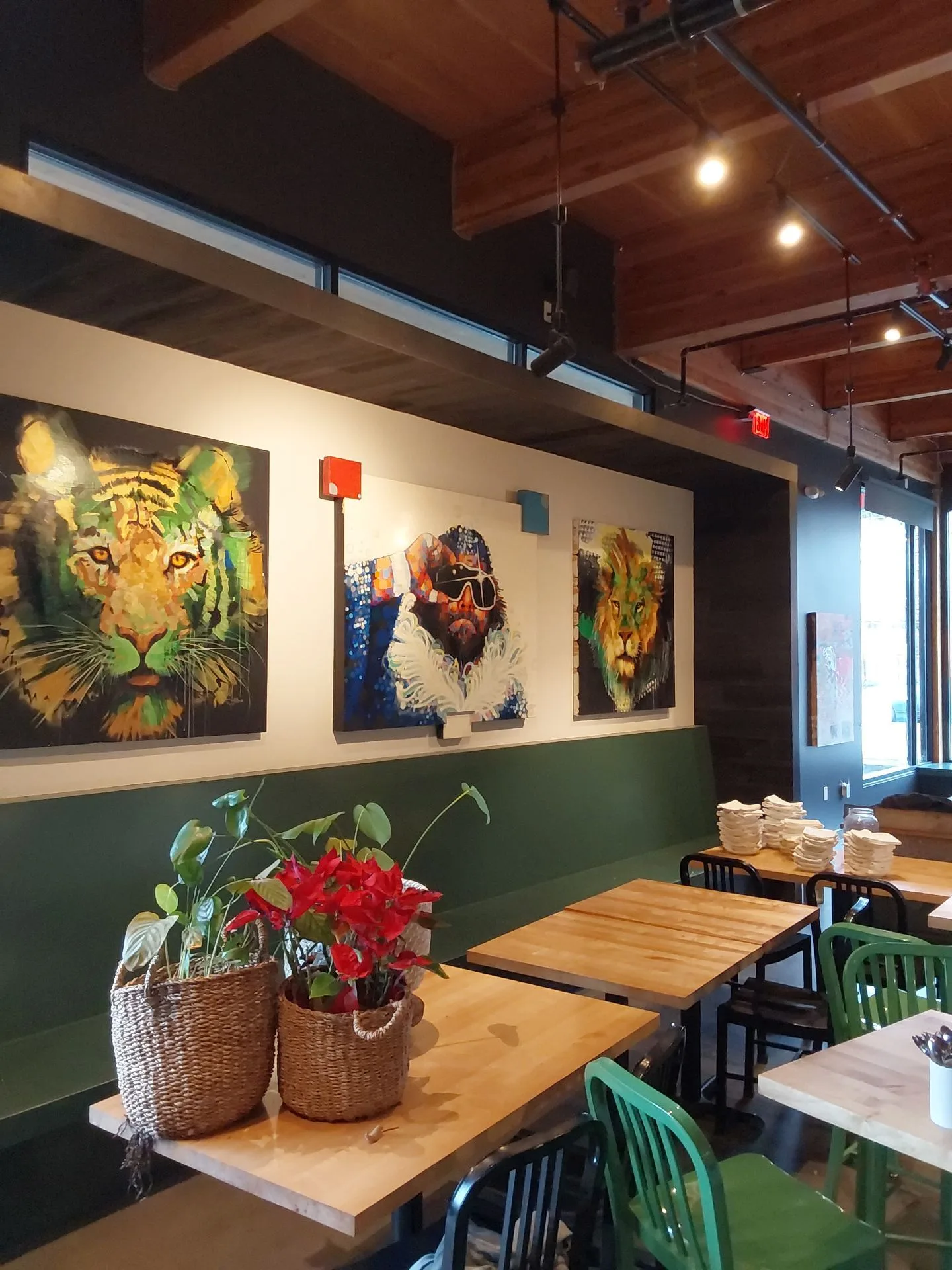 Restaurant interior with freshly painted walls and art display